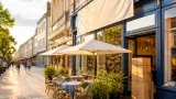 Café Bar Next zieht vom Herrengasse-Standort an den Hauptplatz – Neueröffnung am 4. September
